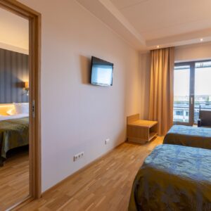 Superior family room with an connecting door